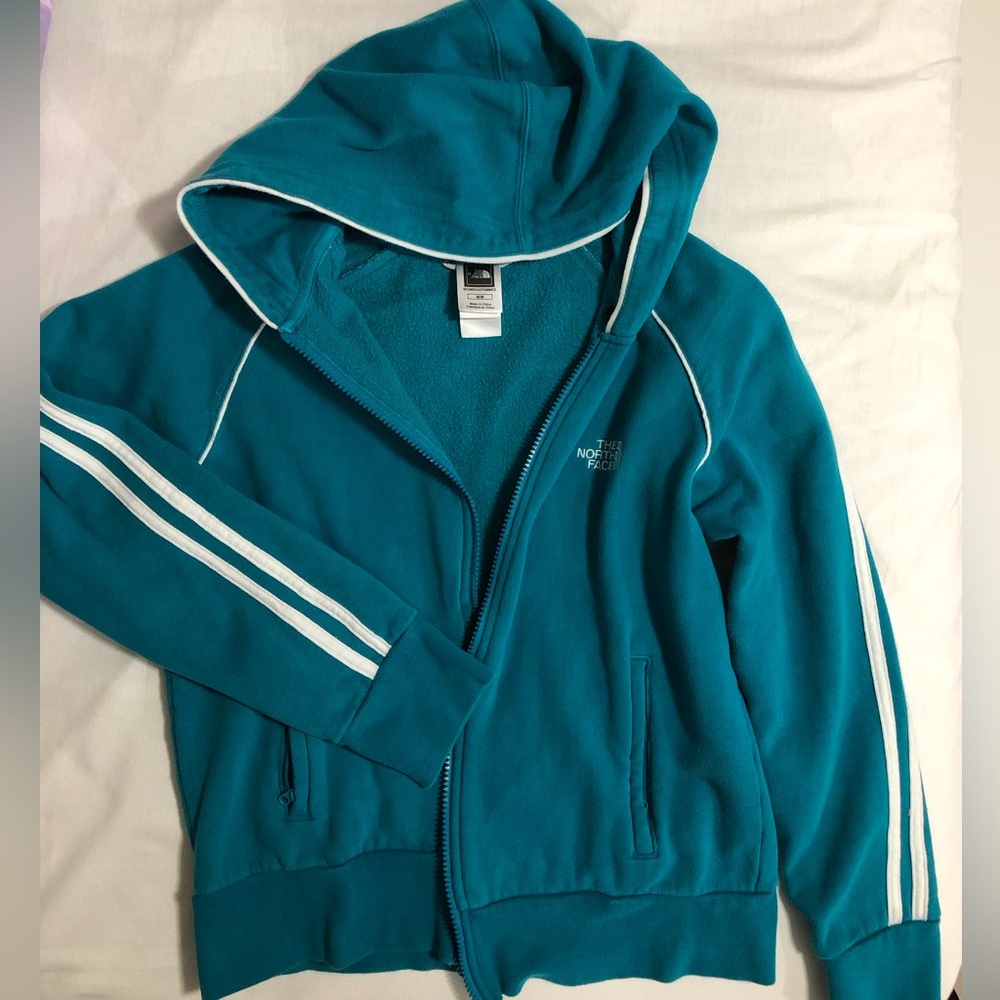 The North face. Women. Zip up hoodie. Used. Runs small.